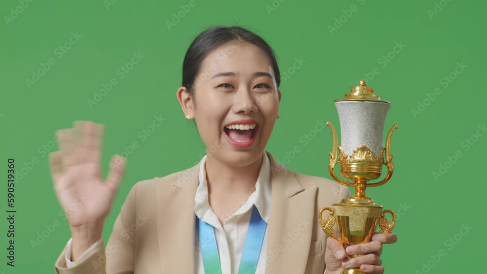 Close Up Of Asian Business Woman In A Suit With A Gold Medal And Trophy ...