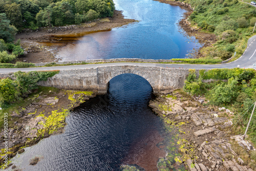 Aerial view of the bridge over Lackagh river close to Doe Castle by Creeslough in County Donegal, Republic of Ireland photo