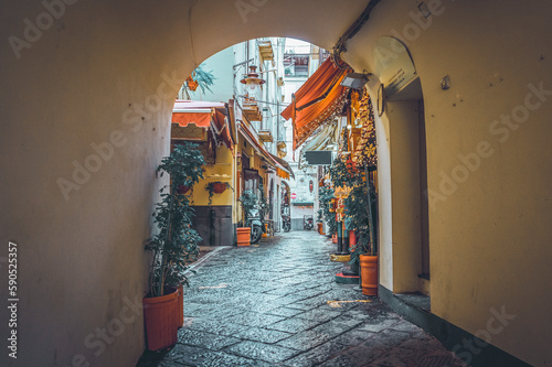 Typical downtouwn street with stores in Sorrento in the south of Italy photo