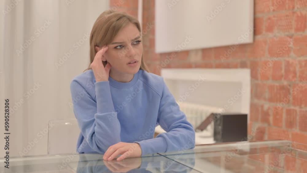 Tired Young Woman having Headache at Home Tired Young Woman having Headache at Home