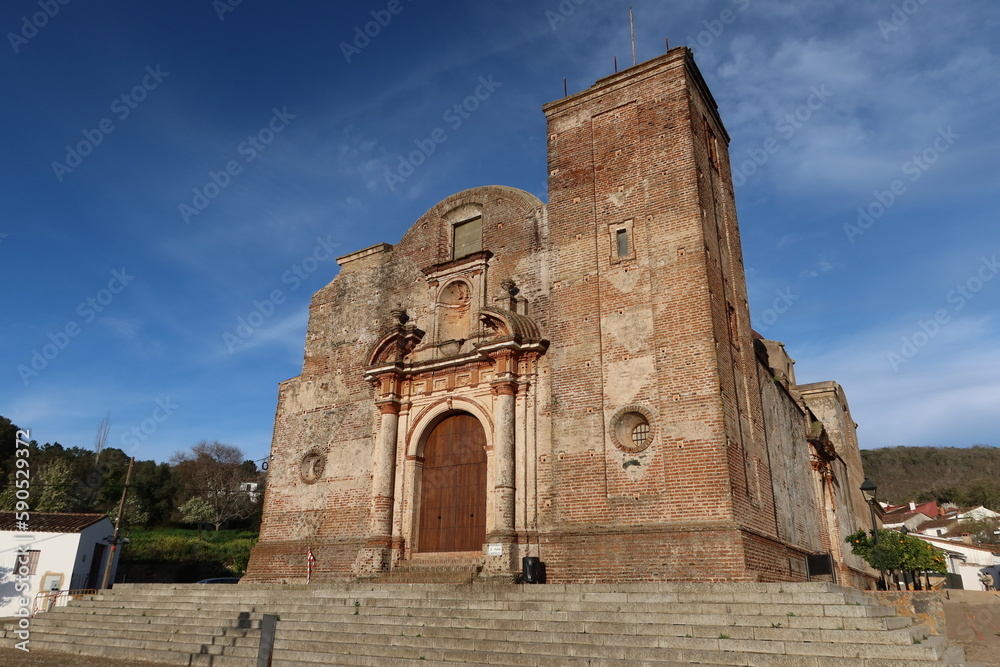 Castano del Robledo, Huelva, Spain, March 30, 2023: Main facade of the unfinished Church (18th century) of Castano del Robledo, Huelva. Spain