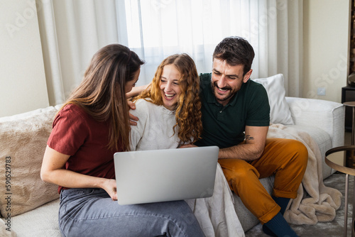 Family of three feeling excited about a new family trip they just booked online.