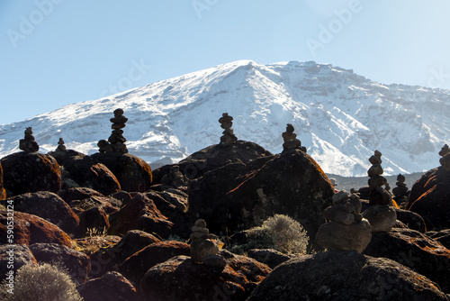 Scenery, rock piles and hiking trail on the slope of Mount Kilimanjaro photo