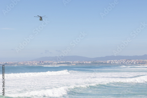 Helicopter fly over the sea