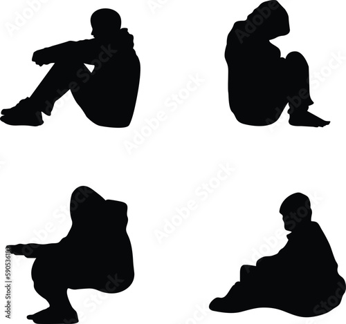 A collection of homeless people sitting down 