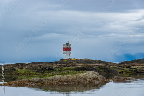 a small costal navigation marker on an island in the chonos archipelago patagonia, aysen region, chile photo