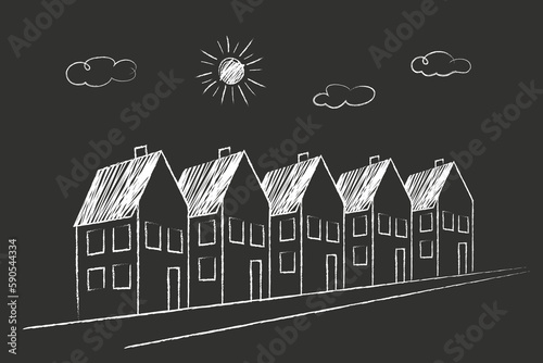 House, sun, clouds. doodles are drawn by a child's hand with chalk on asphalt or on a school board.

