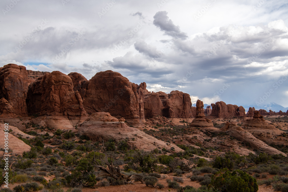 Clouds over unique desert formations in Utah Canyons