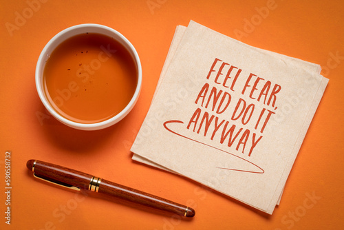 Feel fear and do it anyway - inspiration handwriting, challenge, courage and personal development concept