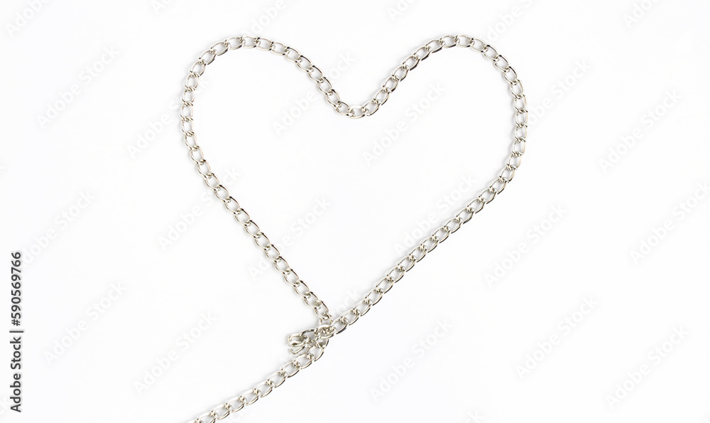 Heart from a silver metal chain on a white background