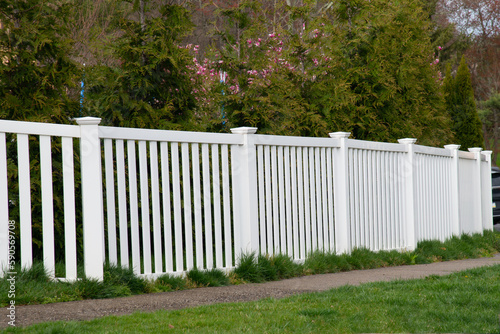 white plastic fence around the house
