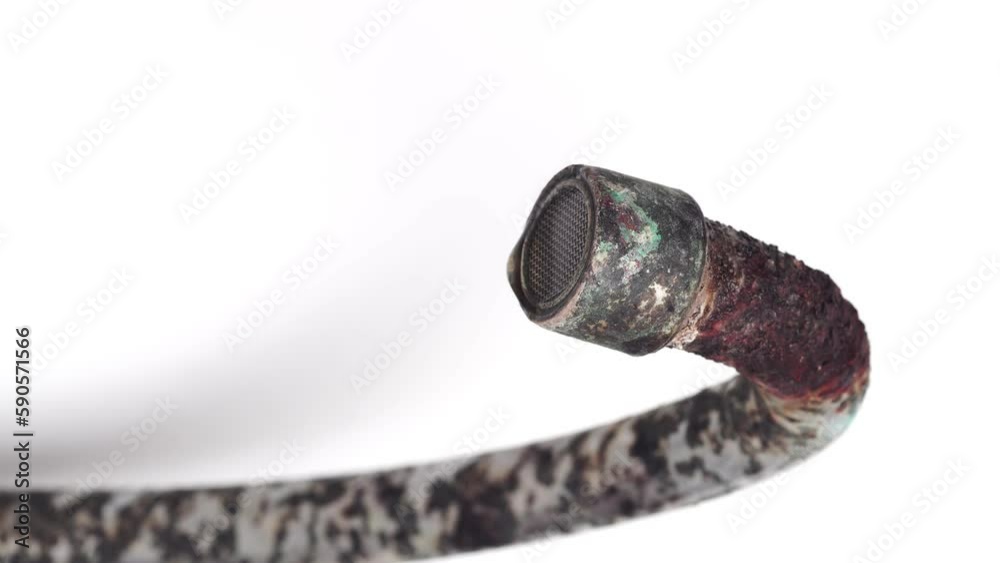 Rusted faucet, macro shot of Corrosion rusted faucet on white background. Water scarcity and water consumption concept idea.                           