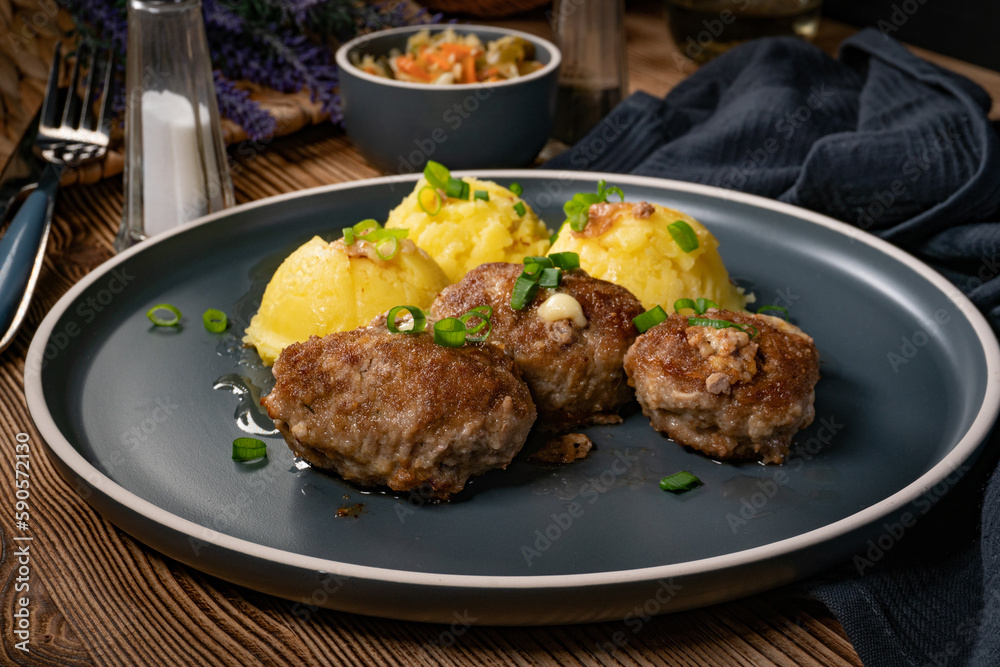 Meatballs with cheese served with boiled potatoes. Meatballs with cheese served with boiled potatoes.
