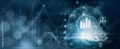 Business hand Worker holding Business analytics Big data analysis technology future concept on VR screen on blur background.