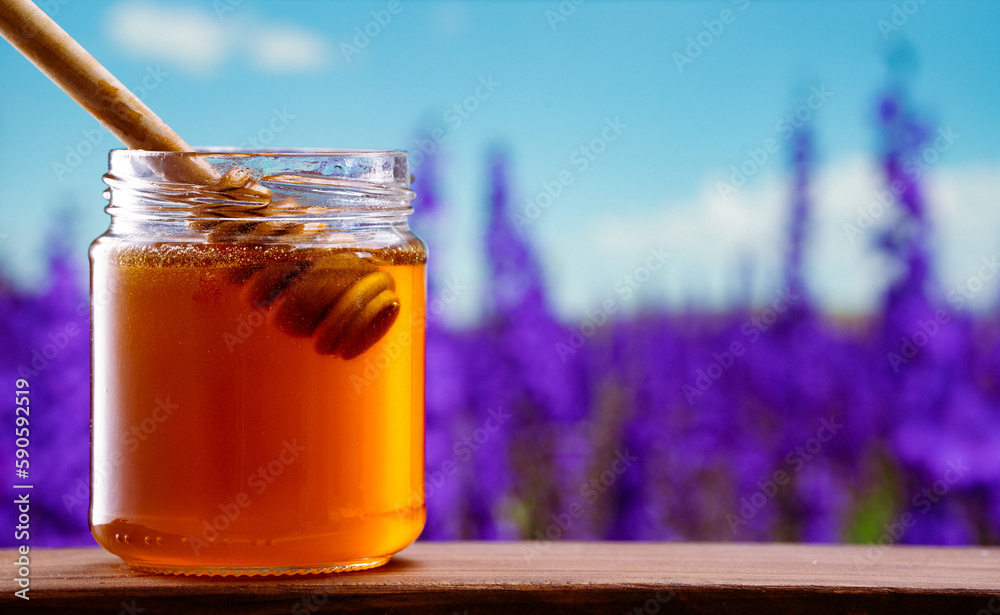 Jar of honey on nature background Jar of honey on nature background