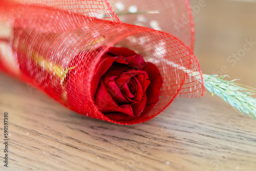 Red rose and electronic book to celebrate Sant Jordi day, April 23 photo