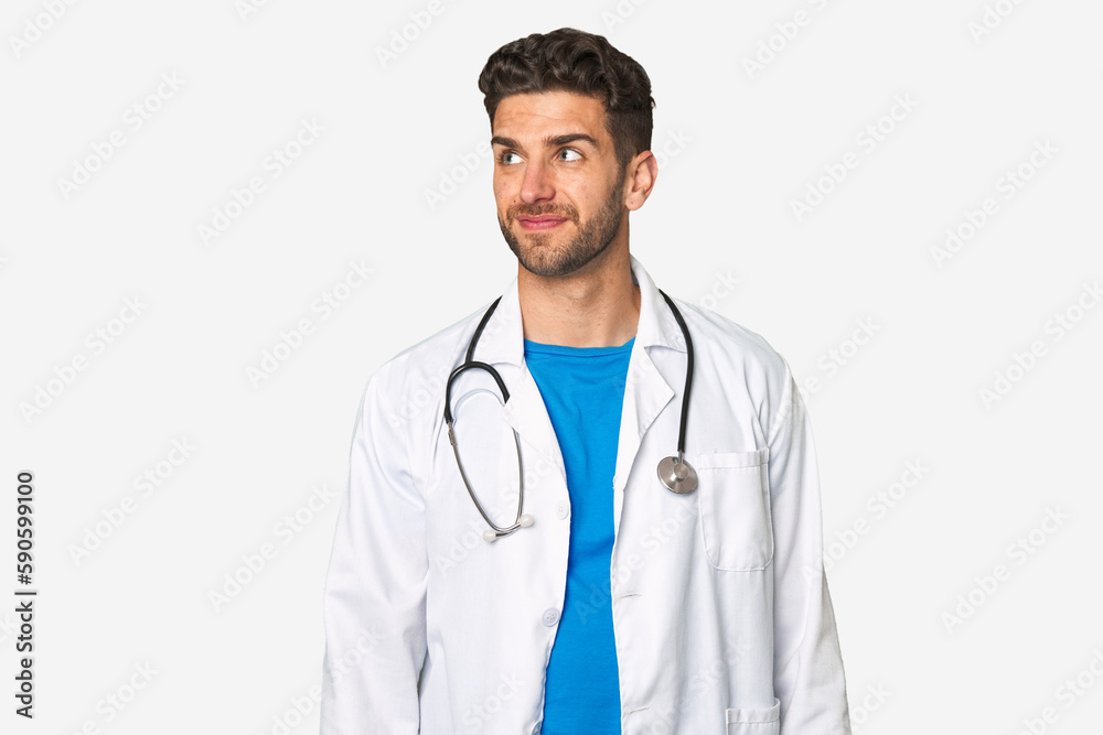 Young doctor man dreaming of achieving goals and purposes Young doctor man dreaming of achieving goals and purposes