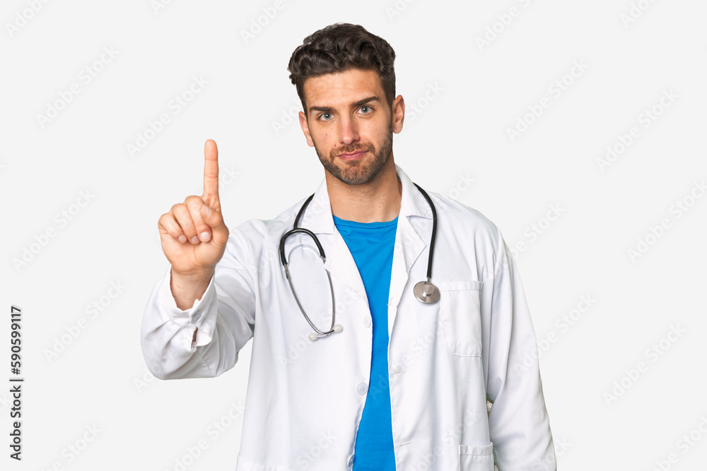 Young doctor man showing number one with finger. Young doctor man showing number one with finger.