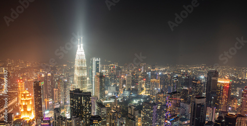 Canvas Print Night time view of Kuala Lumpur City skyscrapers with patronas towers lights