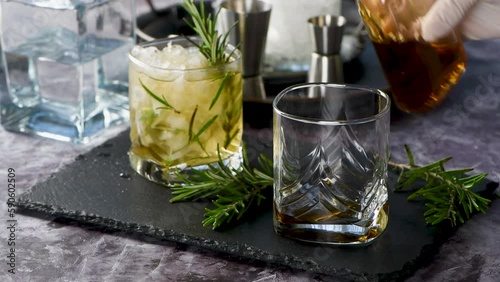 The Rosemary Vodka cocktail consists of maple syrup with a small amount of salt, rosemary, crushed ice and vodka. Vodka can be replaced with other alcohol - tequila, white rum, gin. Unusual, original,
