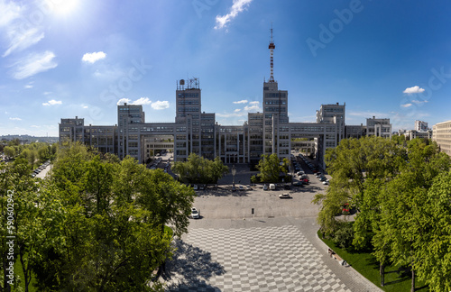 Aerial Derzhprom building in spring greenery on Freedom Square in Kharkiv city center, Ukraine. Constructivist architecture