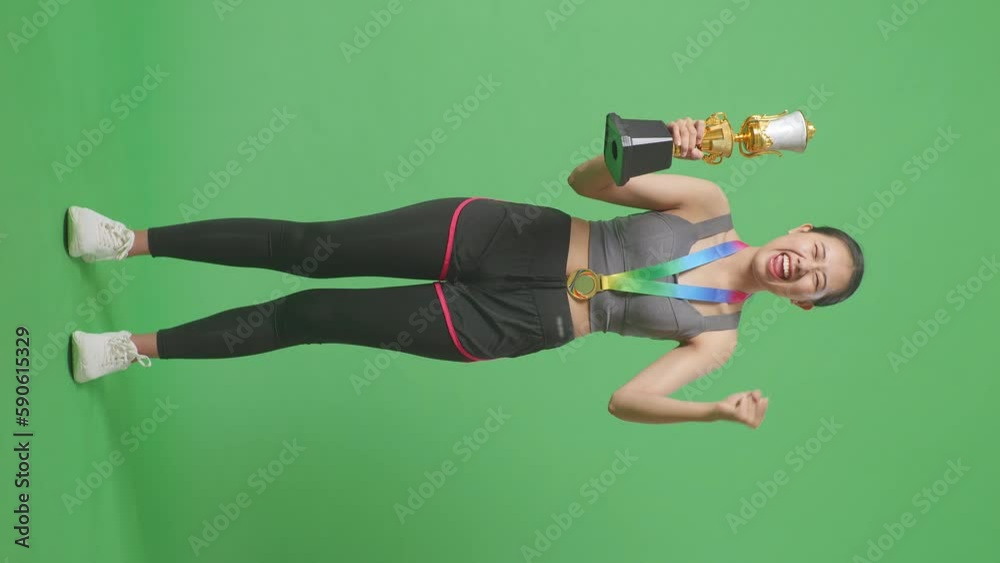 Full Body Of Asian Woman With A Gold Medal And Trophy Screaming Goal ...
