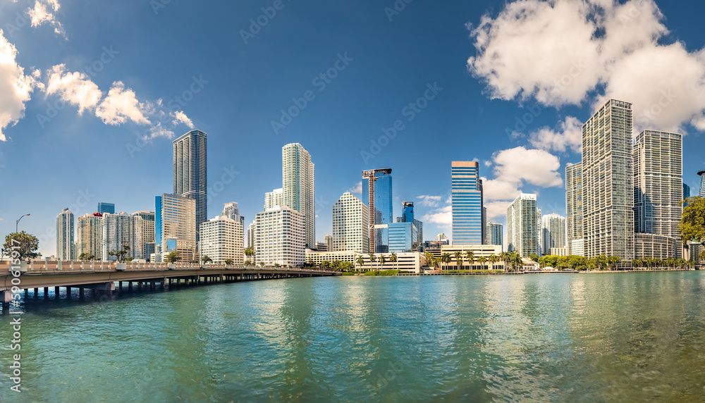 Panorama of Miami, Florida skyline on a sunny morning. Miami is a majority-minority city and a major center and leader in finance, commerce, culture, arts, and international trade.
