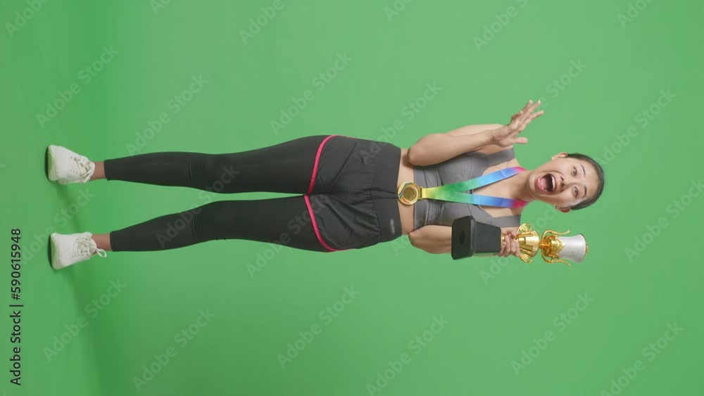 Full Body Of Asian Woman With A Gold Medal Looking At A Gold Trophy In ...