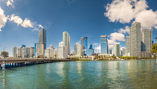 Panorama of Miami  Florida skyline on a sunny morning. Miami is a majority-minority city and a major center and leader in finance  commerce  culture  arts  and international trade.
