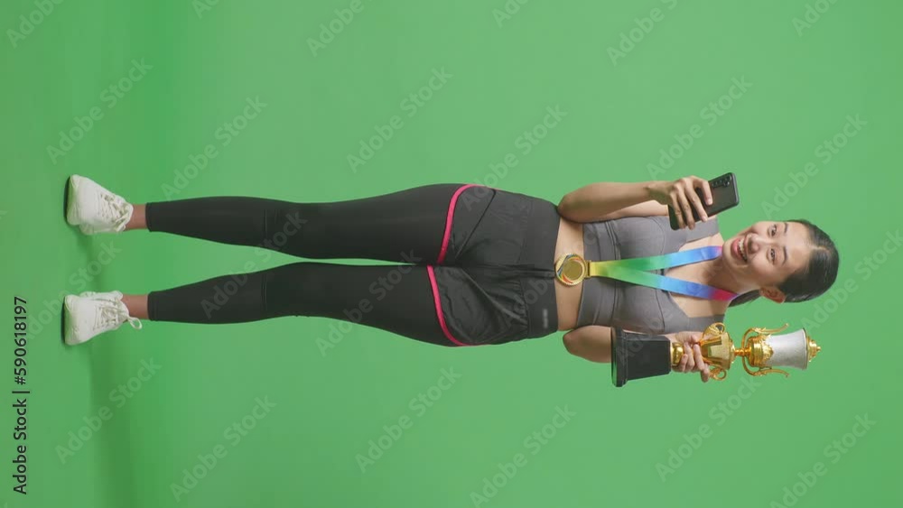 Full Body Of Asian Woman With A Gold Medal Showing Gold Trophy To ...