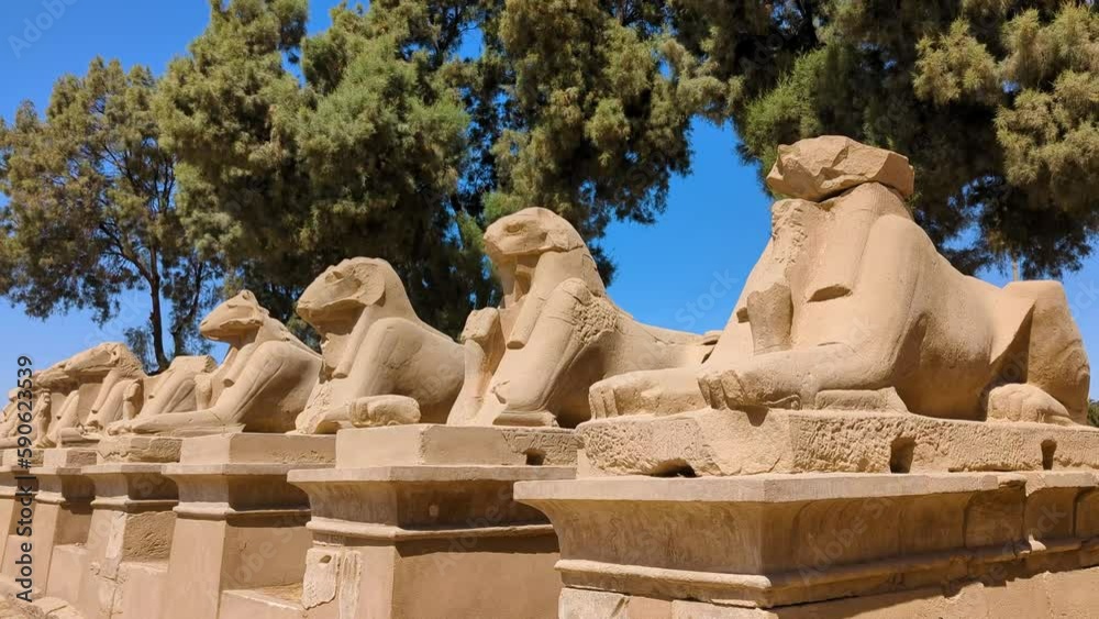 Alley of sheep-headed sphinxes in front of the temple of Karnak in Egypt. Alley of sheep-headed sphinxes in front of the temple of Karnak in Egypt.