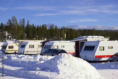 Snowy Winter camping with trailer in Storhogna, Sweden.