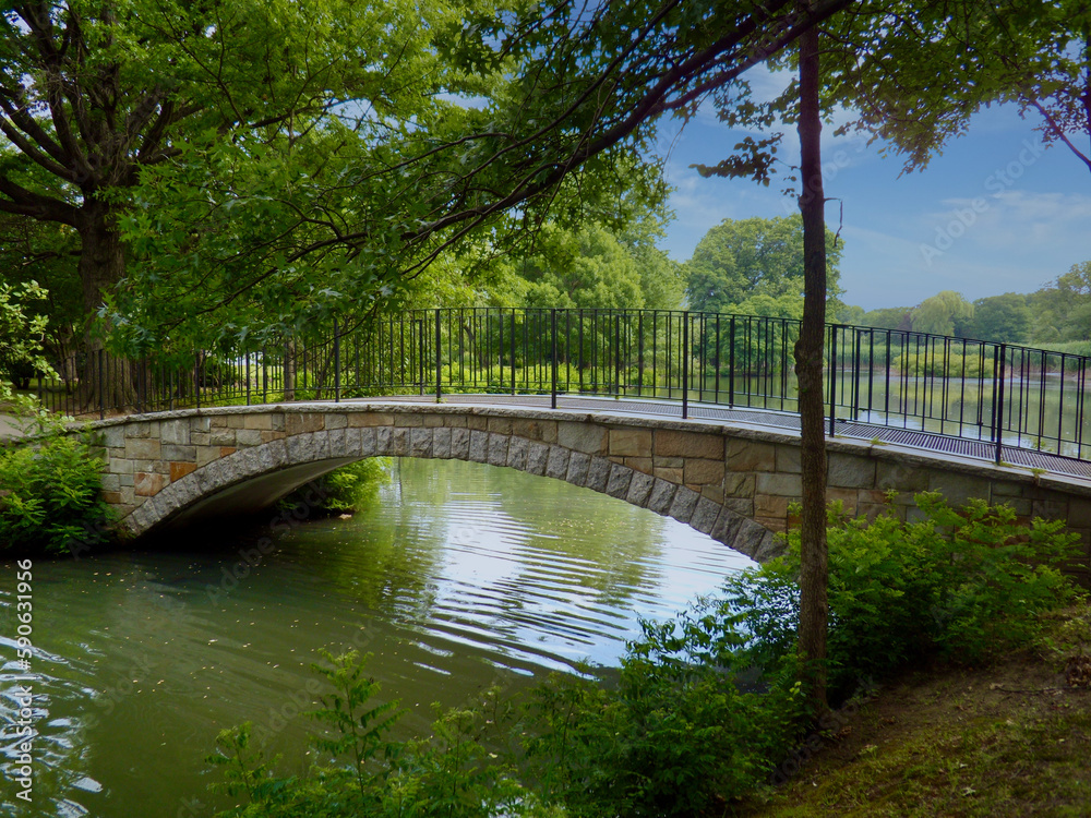 Stone foot bridge over the lake in NYC Central Park Stone foot bridge over the lake in NYC Central Park