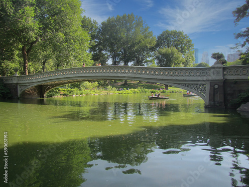 Ornate foot bridge over the lake in NYC Central Park