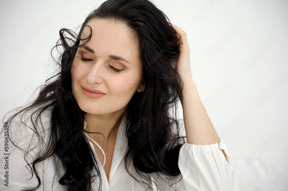 Portait beautiful young woman with long dark hair. On white background. High quality photo Portait beautiful young woman with long dark hair. On white background. High quality photo
