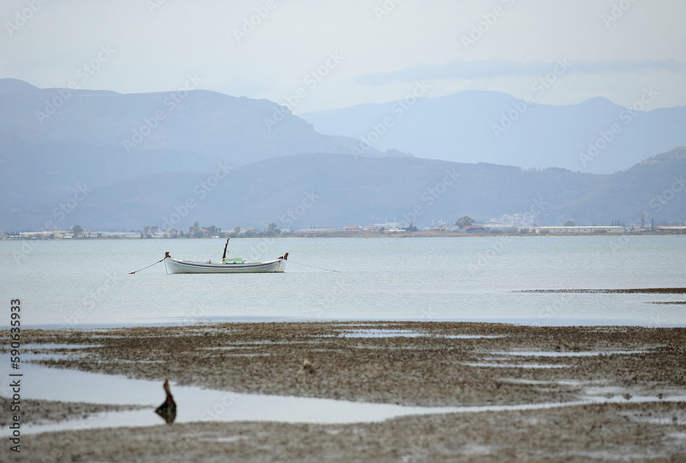 A small fishing boat in the port. The town of Nafplio in the eastern Peloponnese (Greece).