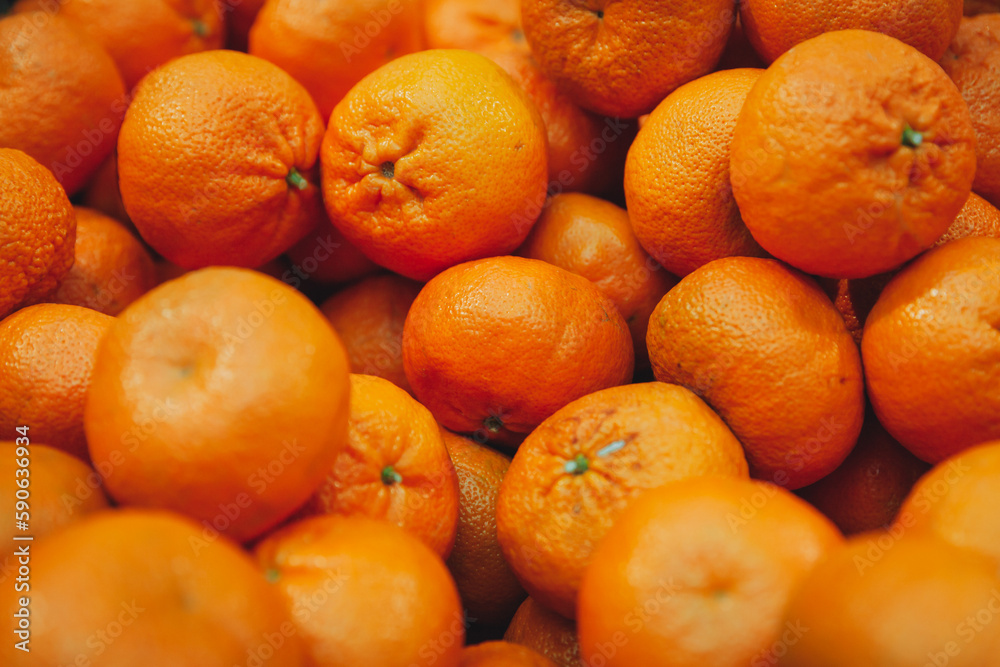 Fresh mandarin oranges fruit or tangerines, as background