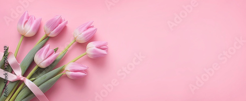 Pink tulips on pink background banner, Space for text. AI generative © fotoyou