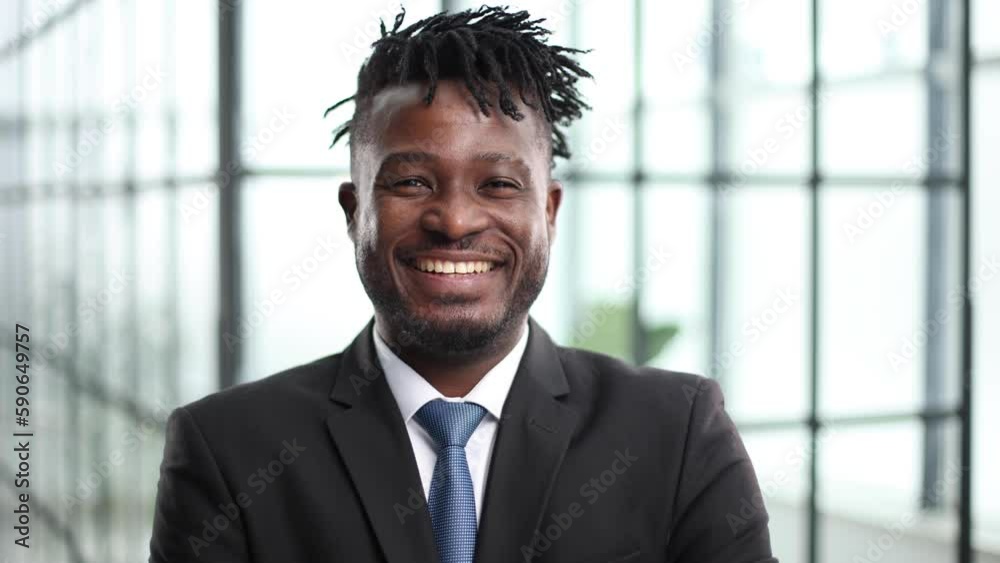 Cheerful black man manager holding , office interior Cheerful black man manager holding , office interior