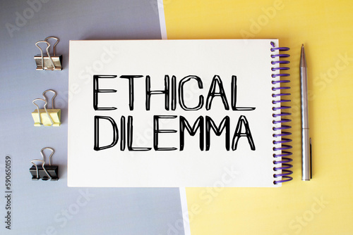 clipboard with white blank paper text ethical dilemma , calculator and chart, business concept.