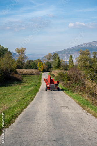 The agricultural machine - the combine is returned to the road after the work is completed.