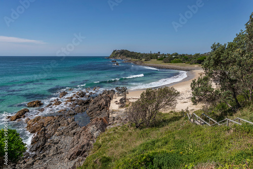 Steps leading down to rocky beach - Pebbly Beach, Forster, NSW, Australia