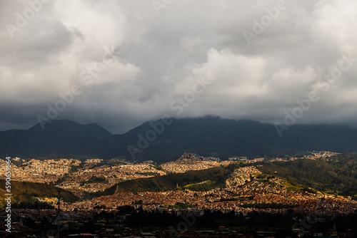 Panoramic of neighborhoods on the outskirts of Bogota (Colombia) during sunset © simonmayer