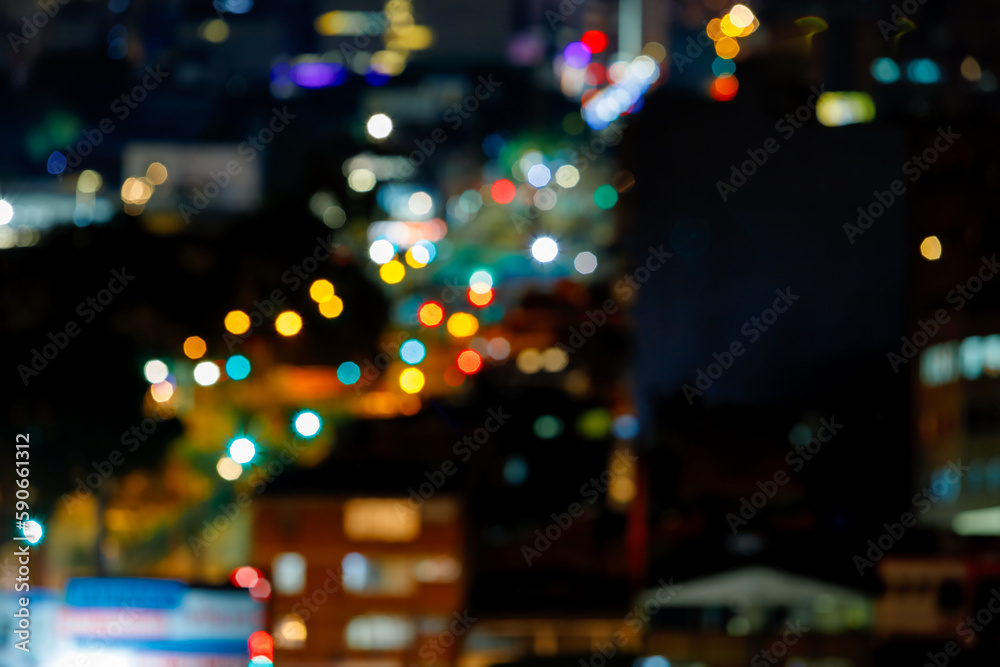 Defocused night panorama of the streets of Bogota, Colombia