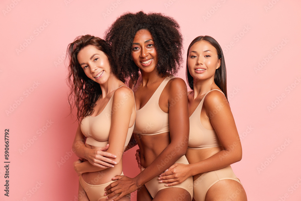 Fotografia do Stock: Three lovely female models dressed in nude