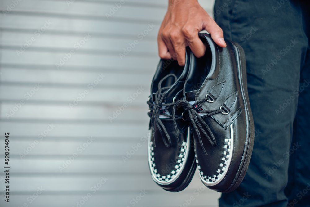 Foto de These black creepers with two tone black and white webbing made