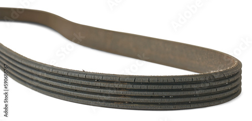 old used and worn out vehicle drive belt isolated, failed and cracked serpentine belt taken in selective focus, replaceable parts