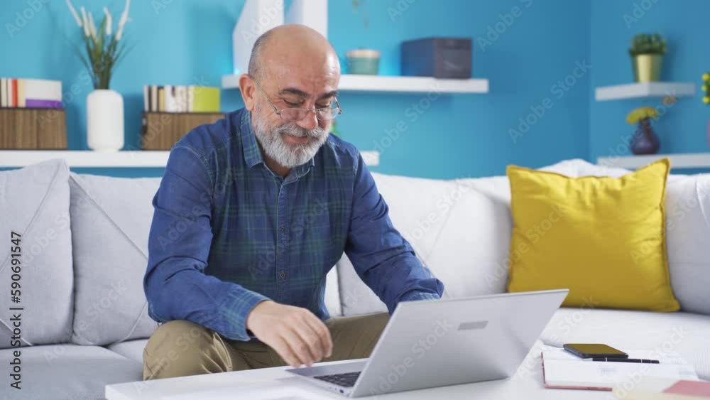 Winner and happy old man smiling.
Man working at home on laptop wins, gets victory and is happy.
Winner and happy old man smiling.
Man working at home on laptop wins, gets victory and is happy.