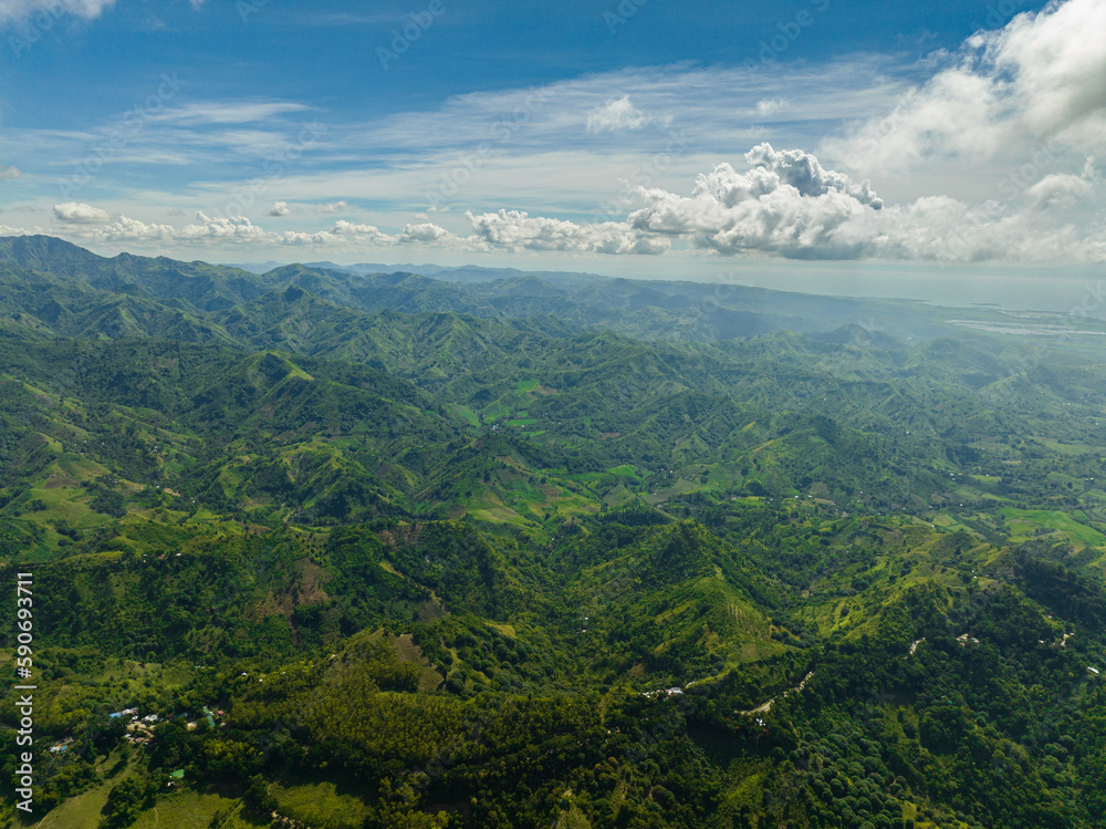 Tropical mountain range and mountain slopes with rainforest. Negros, Philippines