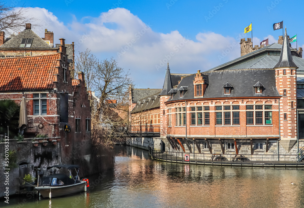 Leie river and medieval houses of Ghent, a city in the Flemish region of Belgium. Travel concept